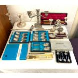 Large selection of silver plated items to include cutlery, candle sticks etc