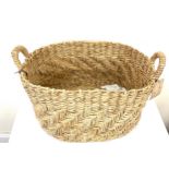 Indonesian hand crafted wicker basket, approximate measurements: Height 12 inches by 15 x 22 inches