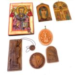 Selection of religious wooden plaques, various terracotta plaques