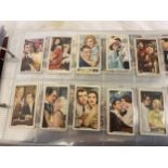 Large selection of cigarette cards in a folder