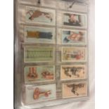 Large selection of cigarette cards in a folder