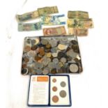 Large selection of bank notes and coins