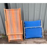 Vintage wooden deck chair and a metal lounger