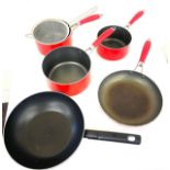 Selection Red John Lewis kitchen pans, Tefal pan