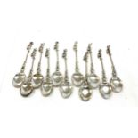 Selection of 10 continental silver ornate decorative lady spoons, total approximate weight 169g