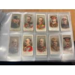 Large selection of cigarette cards in a folder