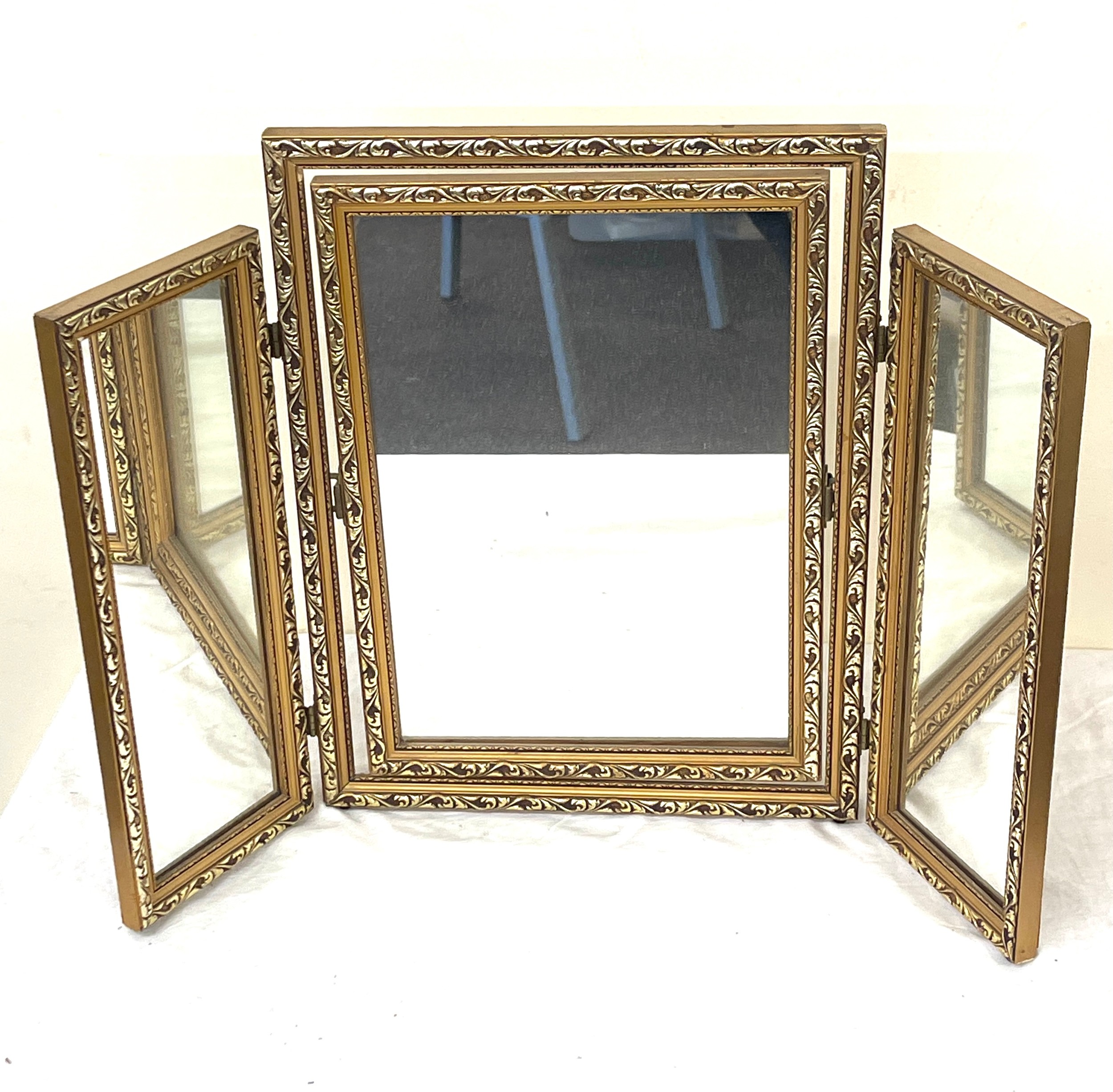 Gilt framed triple dressing table mirror, Height 17 inches, width folded out 25.5 inches