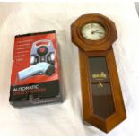 Boxed shoe polishes and a Regulator clock