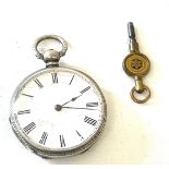 Small silver pocket watch with key, examined by H Singleton, Leamington, untested