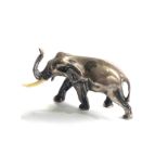 silver miniature fig of an elephant missing tusk weight 22g