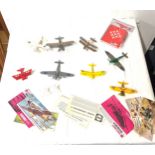 Selection of model planes with paper work