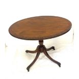 Oval occasional table on casters measures approx 20.5" tall 27" wide 18" depth