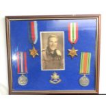 Framed ww2 medal group & photo badge to sherwood foresters