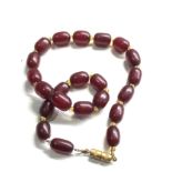 Vintage cherry amber bakelite barrel beads necklace internal streaking, 21.8g