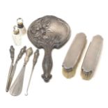 Selection of silver items includes mirror brushes scent bottles etc