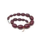 Cherry amber bakelite bead necklace good internal streaking weight 76.6g