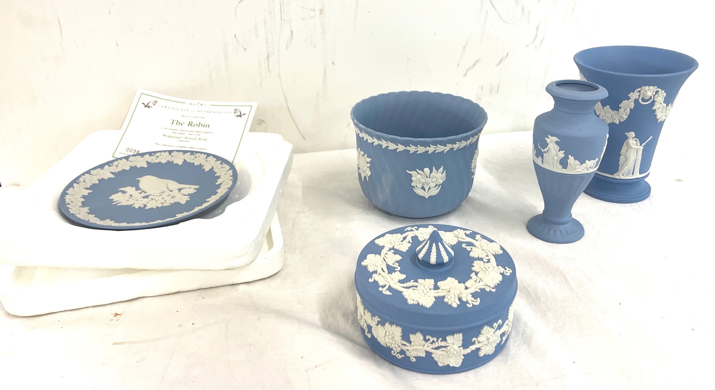 Selection of Wedgwood Jasperware Blue pieces to include, Vases, lidded trinket etc