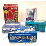 Selection new items in boxes to include TV aerial, Yogo ball, rolled up piano, digihome DV940b,