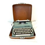 Vintage cased Smiths Corona portable typewriter