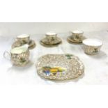 Royal Crown pottery crinoline lady tea set