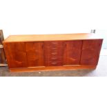 4 Door 5 draw teak long sideboard measures approx 29" tall 78" wide 16.5" tall