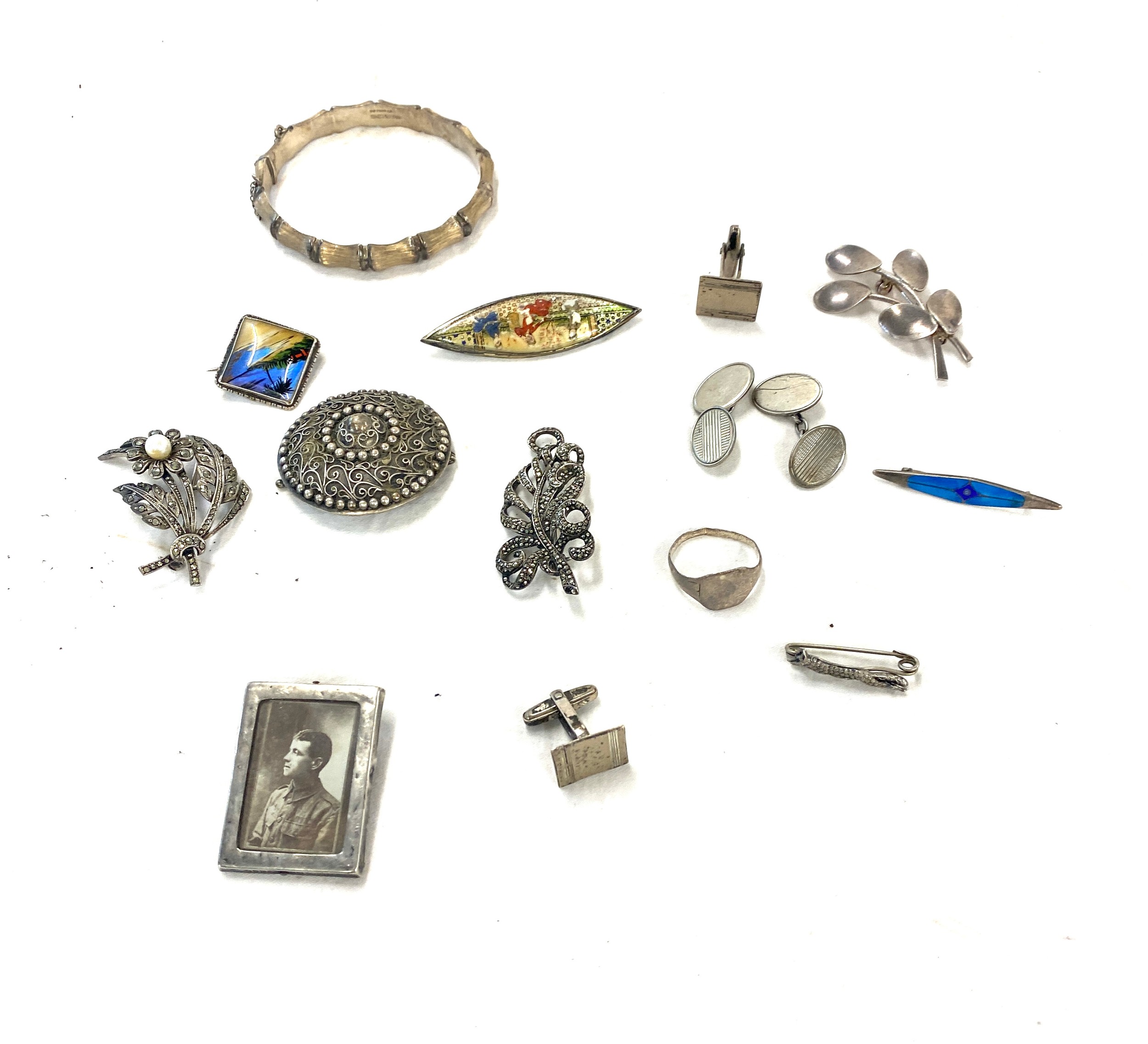 Selection of items to include silver bangle, photo frame, brooches etc