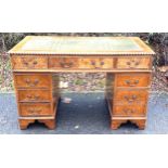 8 drawer Burr walnut twin pedestal desk with pie crust edge and leather insert to top 31" tall 48"