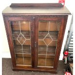 2 door leaded oak bookcase, approximate measurements: Height 47 inches, Width 36 inches, Depth 12