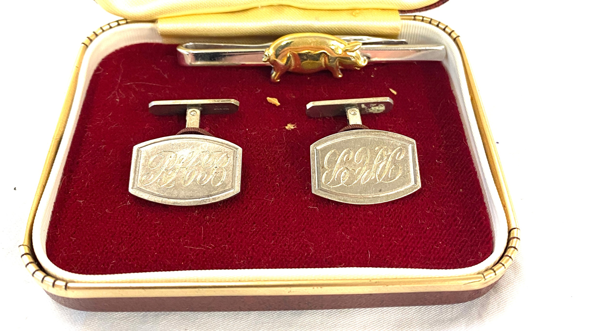 Hallmarked silver cufflinks and a silver pig tie pin