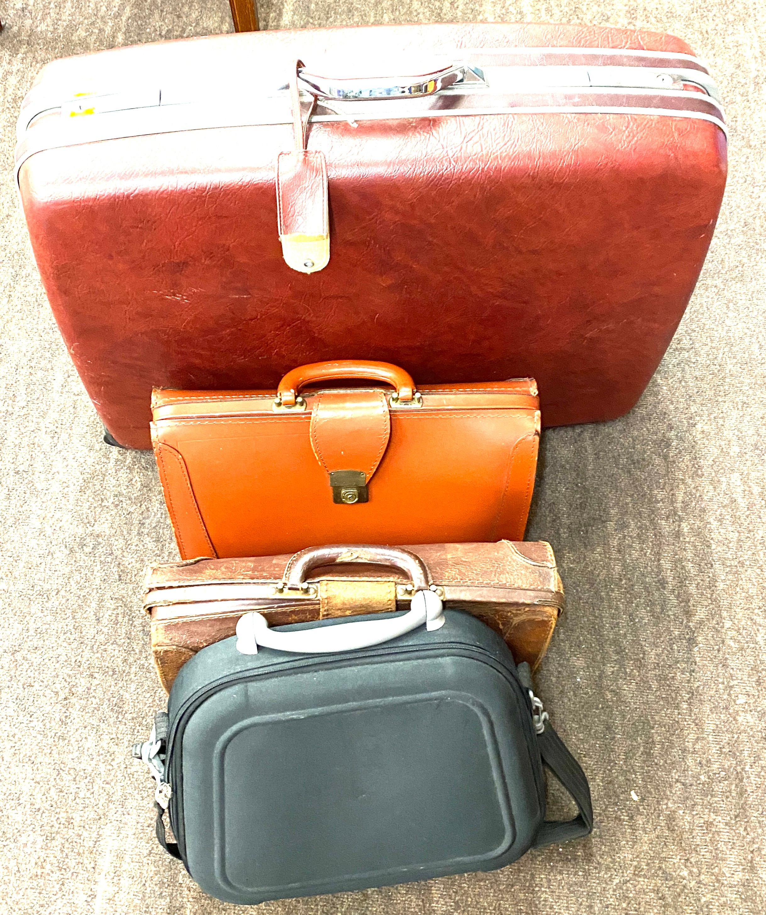 Selection of vintage briefcases and handbags