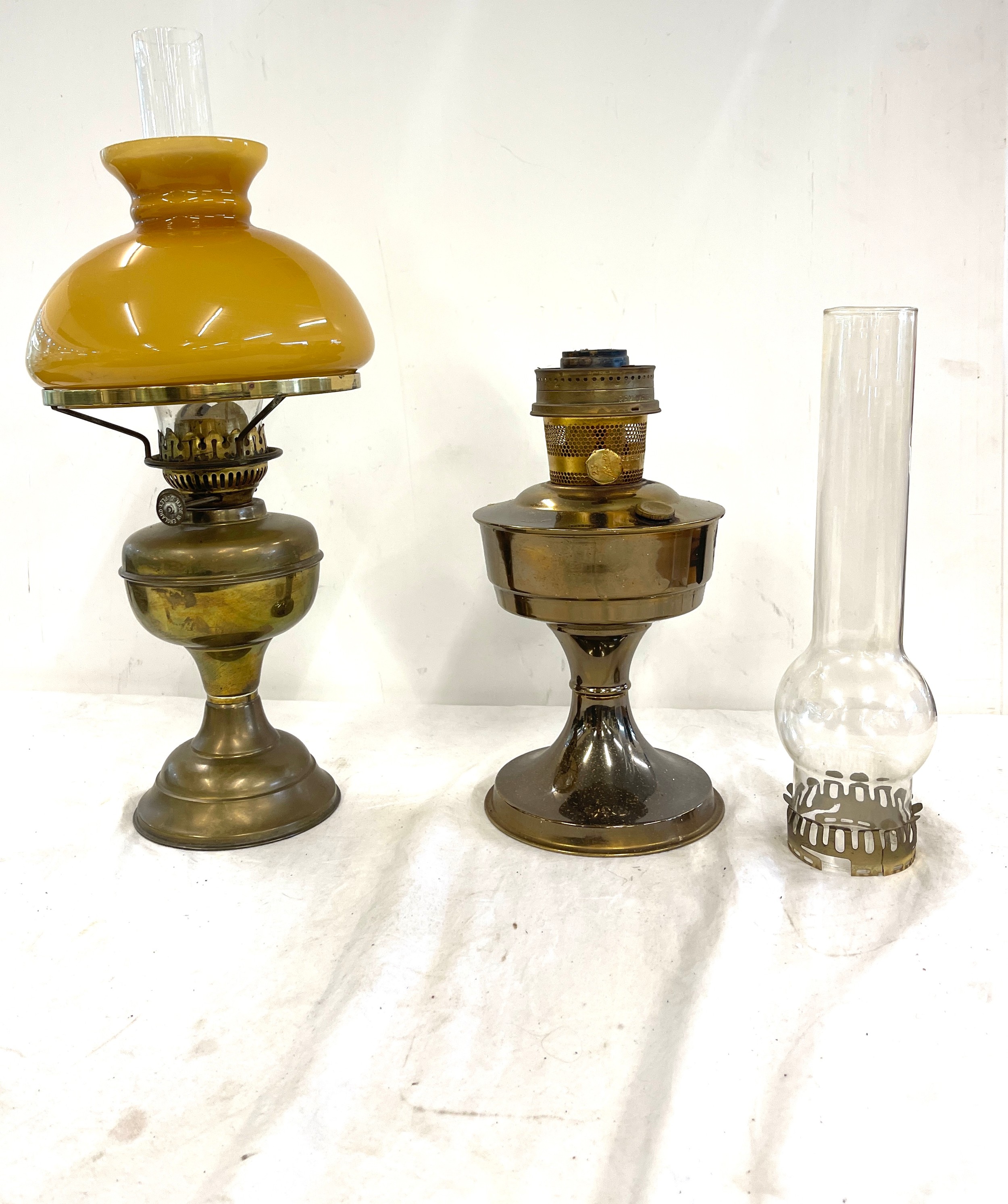 2 Vintage oil lamps, both with funnels, 1 with shade