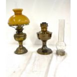 2 Vintage oil lamps, both with funnels, 1 with shade