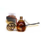 Dimple, Old Blended Scotch Whisky, 1950s spring cap bottling together with a musical liqueur set