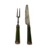 A pair of green-stained bone handled knife and fork,