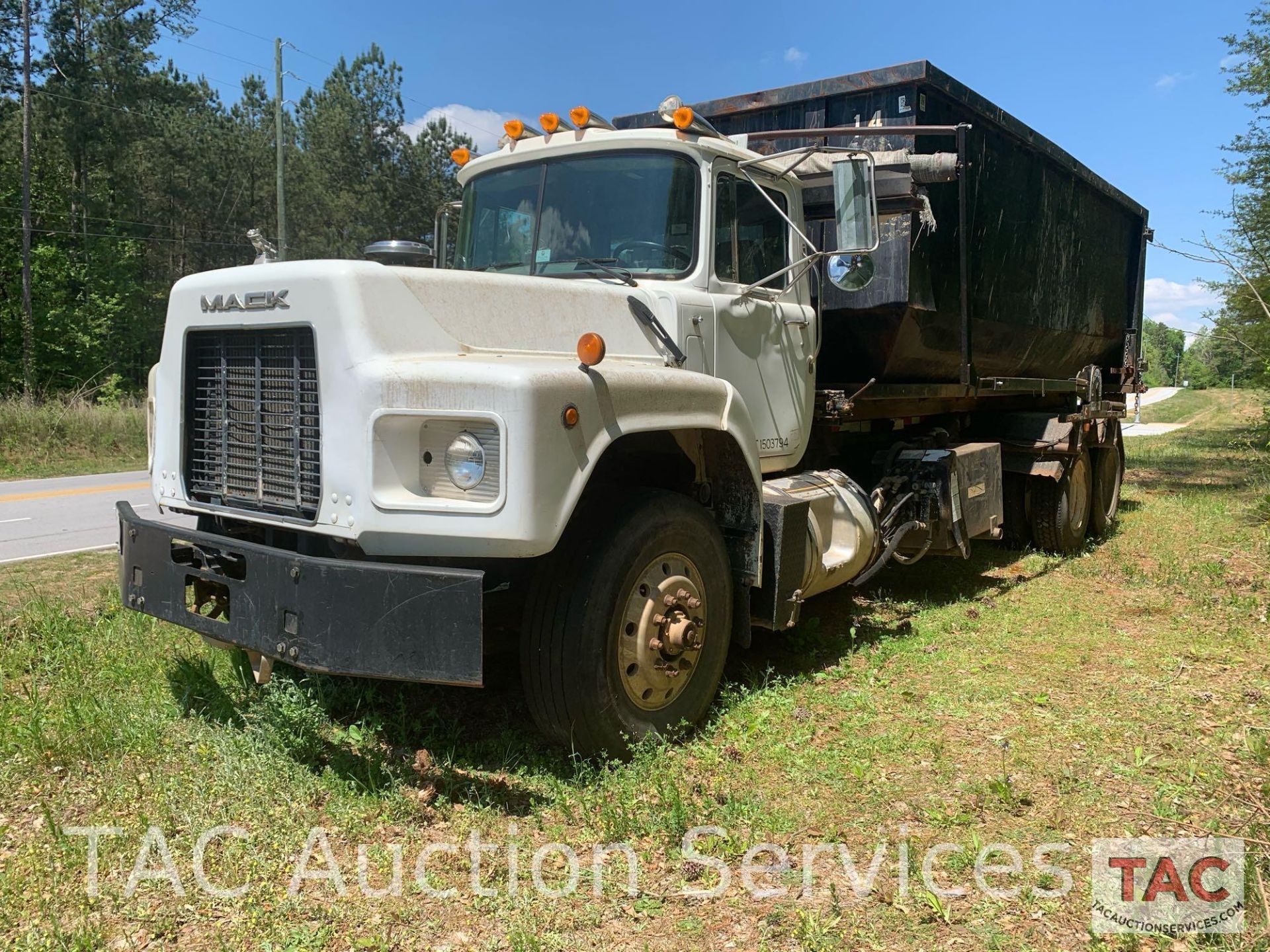 2000 Mack RB688S Roll-Off Truck