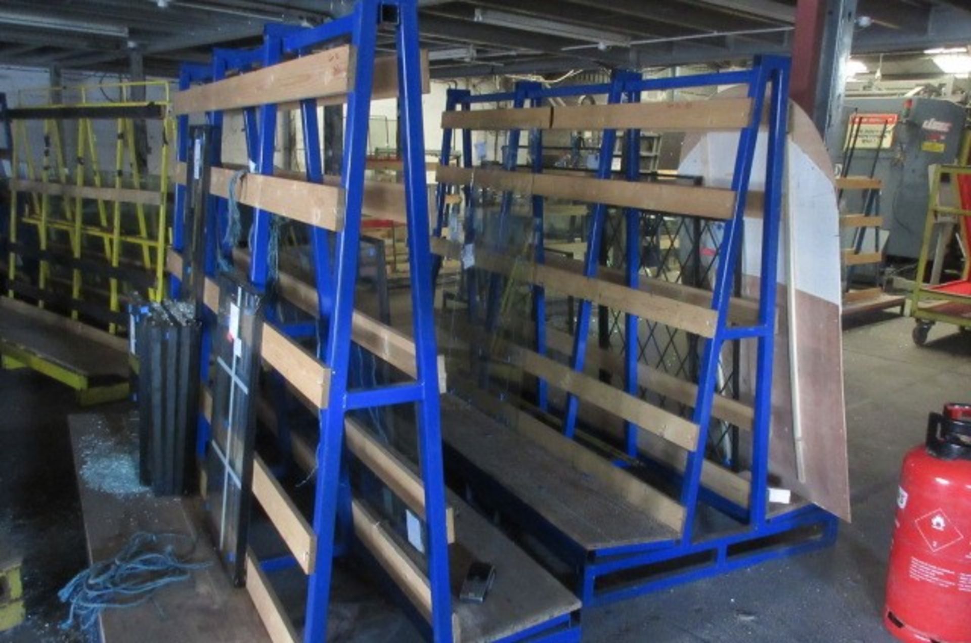 Five static 'A' framed glass storage racks. Size 2.4m x 1.2m x 1.6m high.