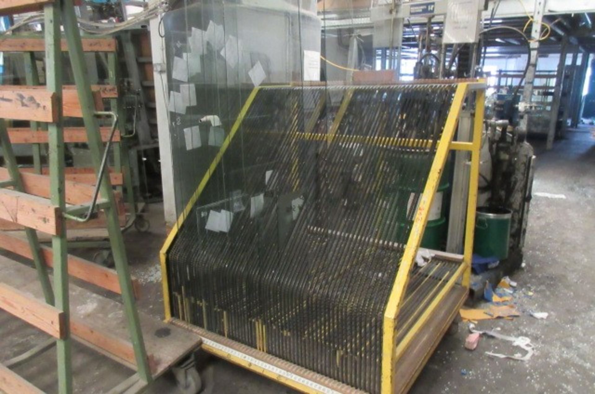 Four mobile 60 space glass transportation racks. Size 1300 x 1300 x 1500mm high.