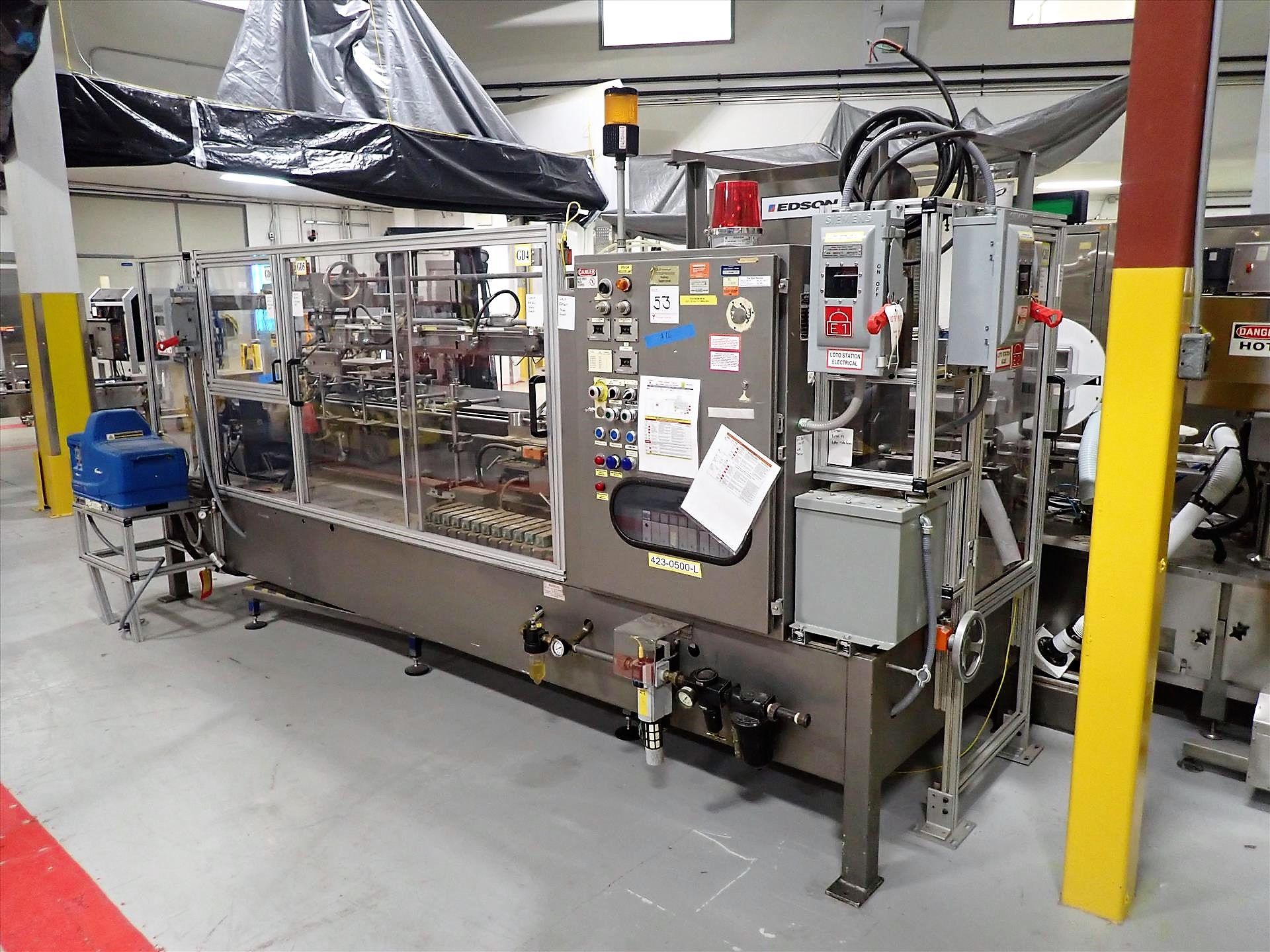 Edson mod. 3100 cartoner, ser. no. 5781 c/w Nordson ProBlue7 hot melt glue system (2011)