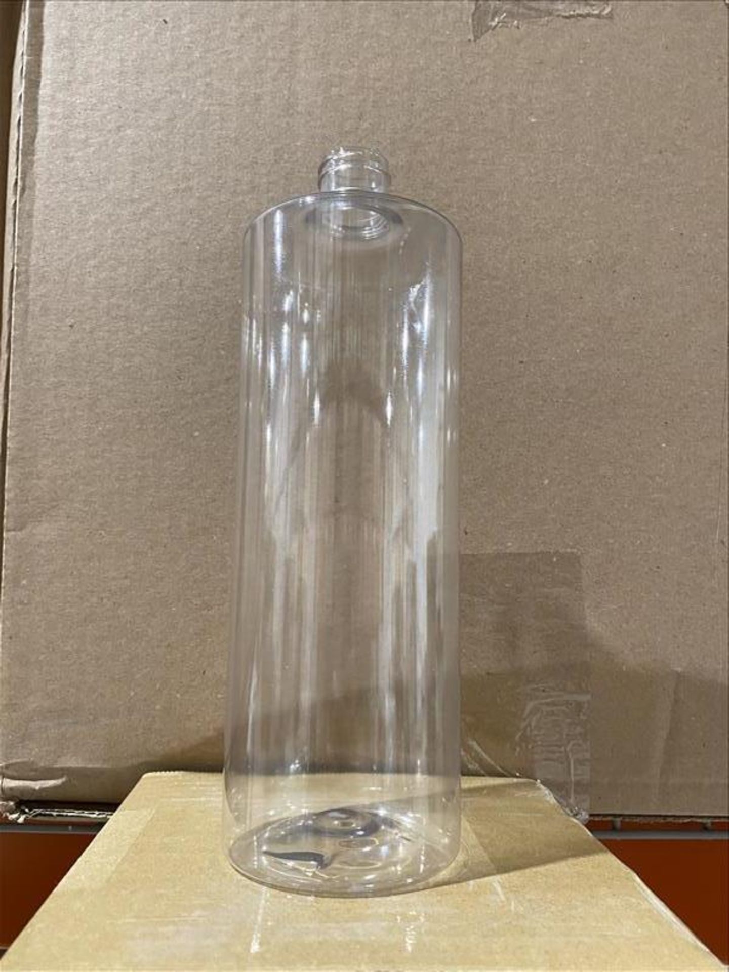 1 Pallet of Empty 1L Clear Cylinder Shape Bottles, 98 Bottles per case, 20 cases ( 1,960 bottles)