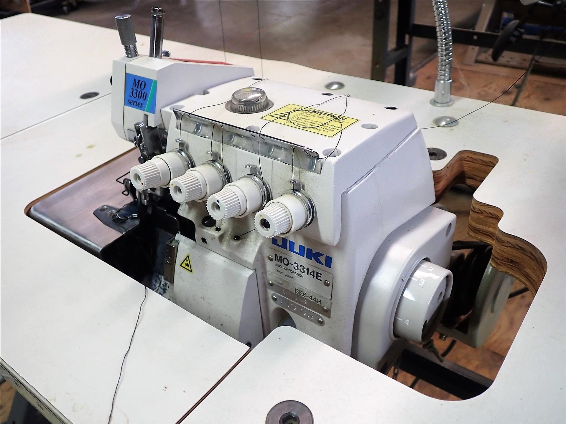 Juki industrial overlock sewing machine, mod. MO-3314E, S/N 5MOTG17905 c/w 20 in. x 48 in. - Image 2 of 6