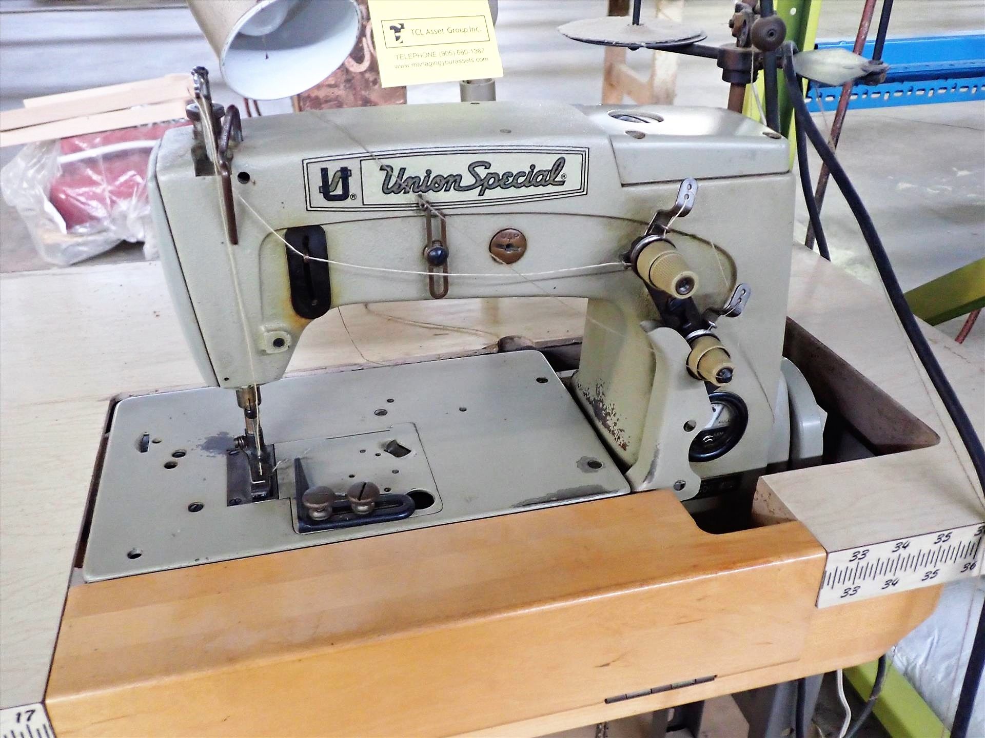 UnionSpecial industrial sewing machine, mod. 56300AU, 8 in. throat, 1/2 hp c/w 20 in. x 48 in.