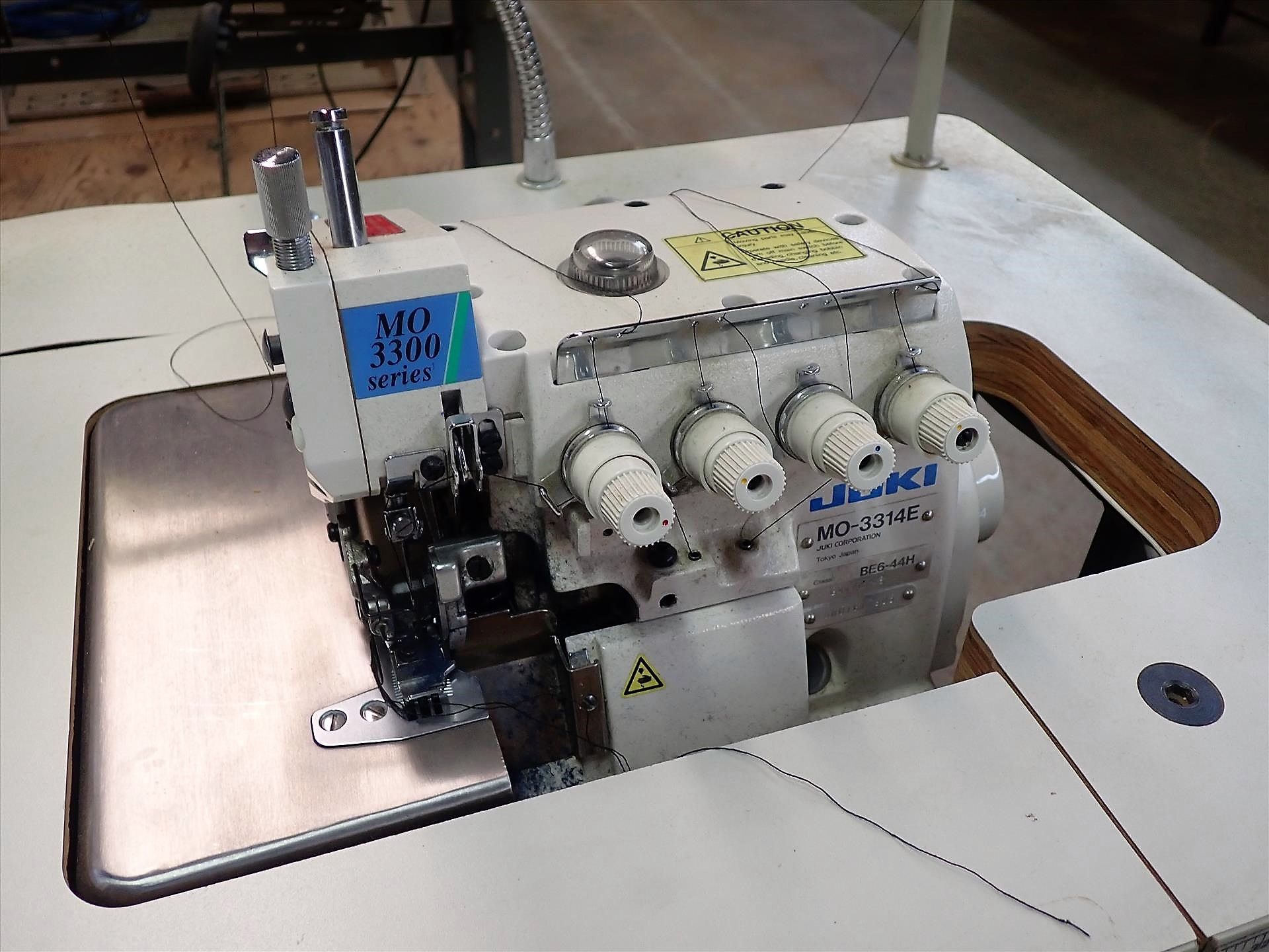 Juki industrial overlock sewing machine, mod. MO-3314E, S/N 5MOTG17905 c/w 20 in. x 48 in.