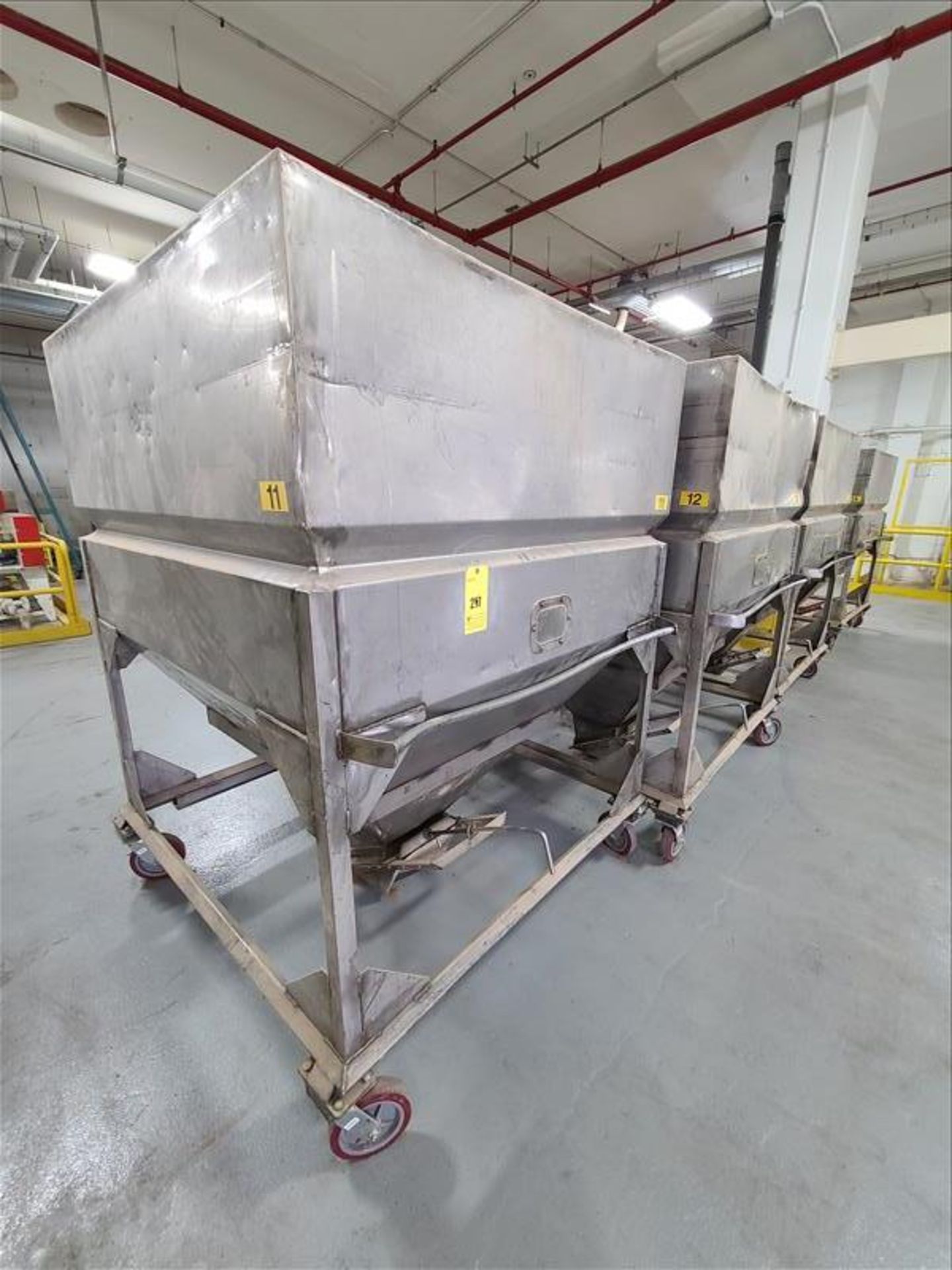 [LOT] (4) stainless product hopper bins, 67"h x 5'w x 5'l, bottom slide gate, mobile [Packaging