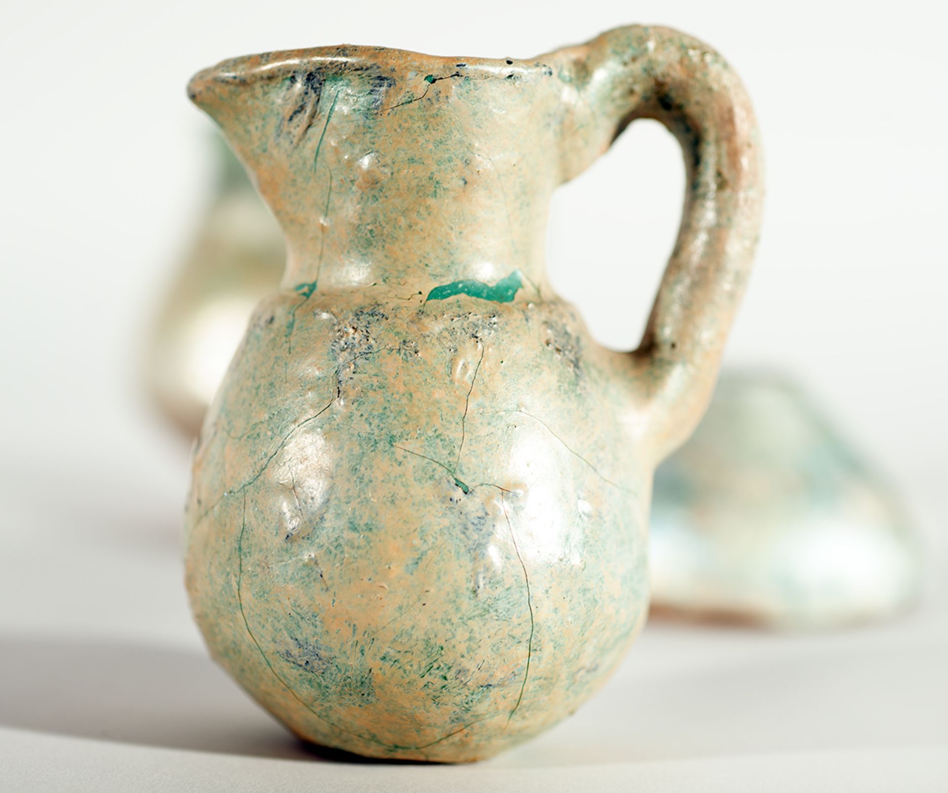 Set of three glazed ceramic Arab jugs - Image 2 of 5