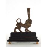 Candlestick in the shape of a lion in bronze, 18th century