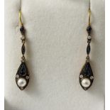 A pair of drop earrings set with sapphires, diamonds and pearls. Boxed