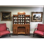 A Fine Satinwood display cabinet in the style of Ince and Mayhew.