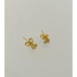 Pair 18ct yellow gold four claw RBC diamond solitaire studs. 0.62ct total. Boxed