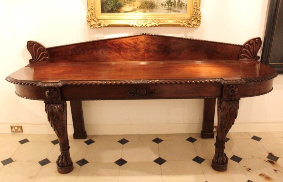 George III Mahogany serving table. Circa 1815. With splash back and decorated with a deep hadron