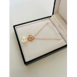 9ct rose gold pearl pendant with diamonds. D 0.04ct. Boxed